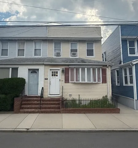 a front view of a house with windows