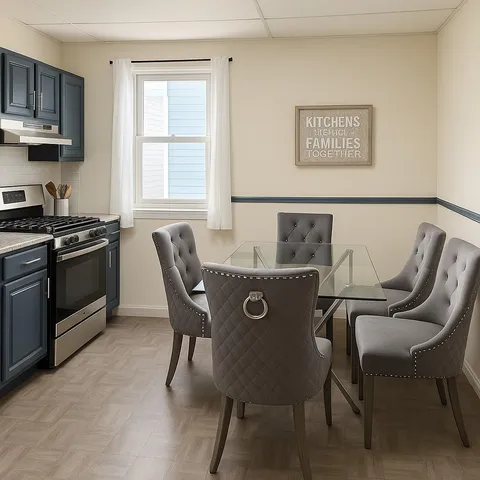 a view of a kitchen with dining table and chairs
