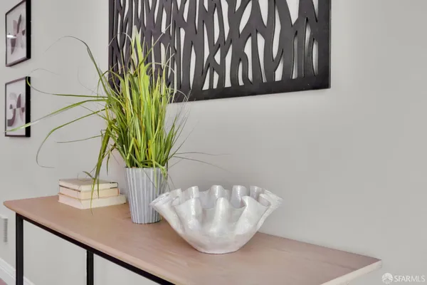 a vase of flowers sitting on a table