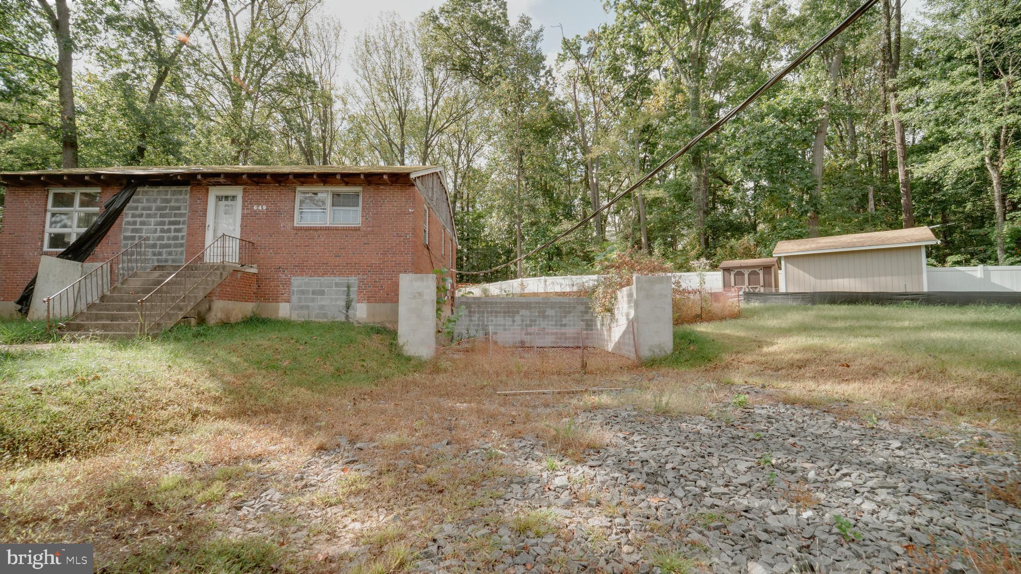 6649 Kerns Road Falls Church, VA 22042 - Photo 13 of 38 a view of a backyard with large trees