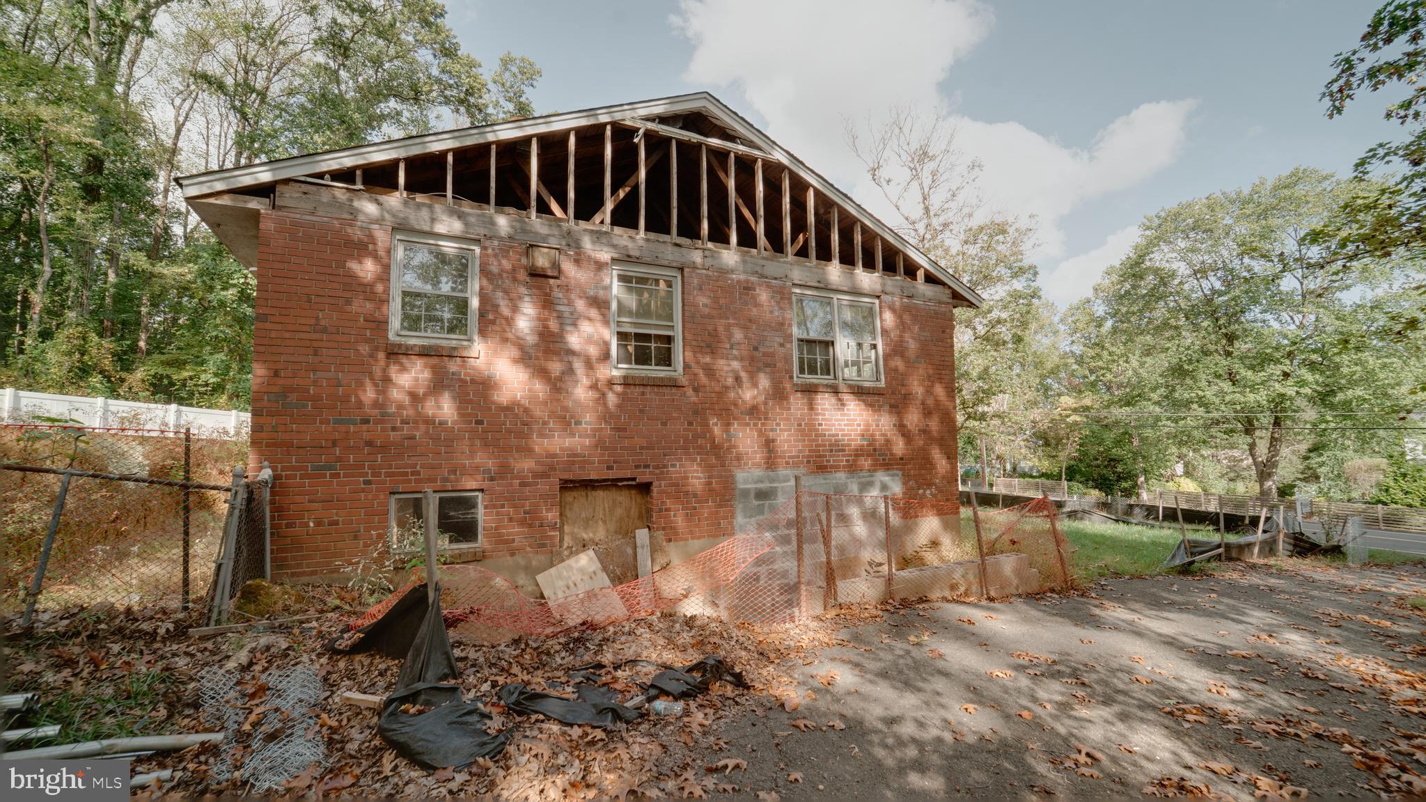 6649 Kerns Road Falls Church, VA 22042 - Photo 22 of 38 a view of a house with a yard