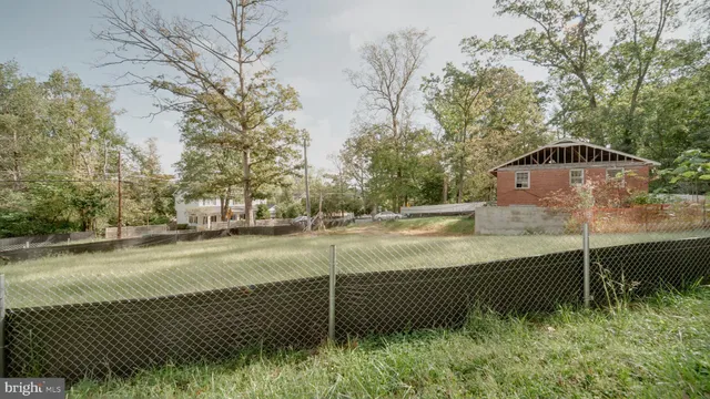 a view of backyard with green space