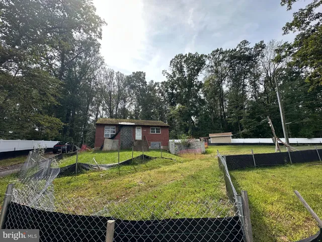 a view of a swimming pool with chairs