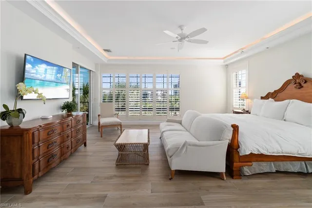 a kitchen with stainless steel appliances granite countertop a stove and a white wooden cabinets