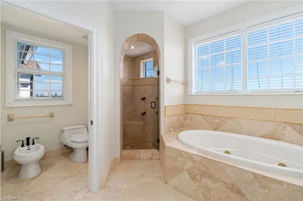 a view of roof deck with ocean view