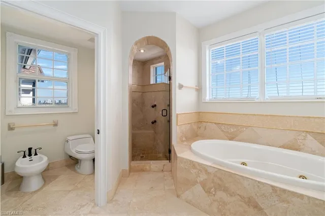 a view of roof deck with ocean view