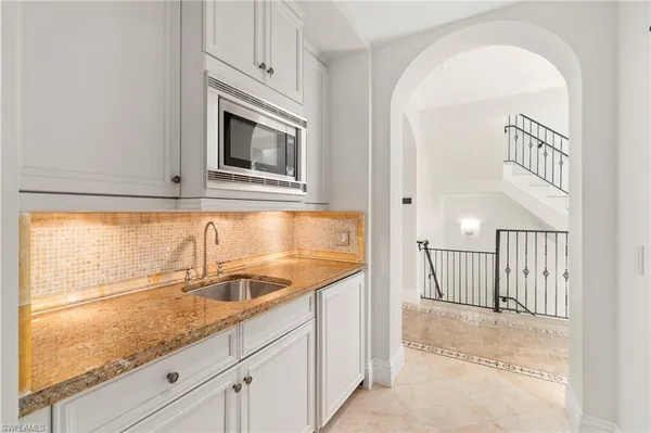 a bathroom with a bathtub and a toilet