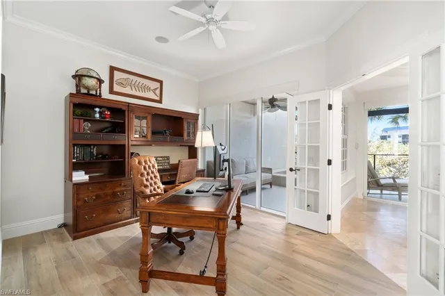 a view of a workspace with furniture