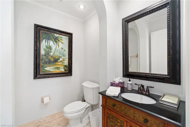 a view of a workspace with furniture and wooden floor