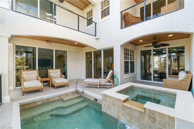 a view of a building with sitting area