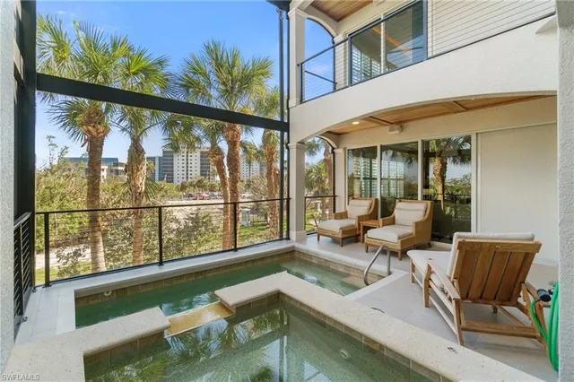 a living room with large windows