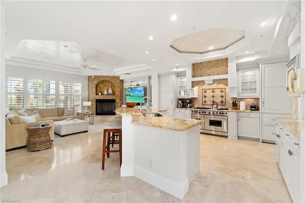 a kitchen with counter top space and appliances