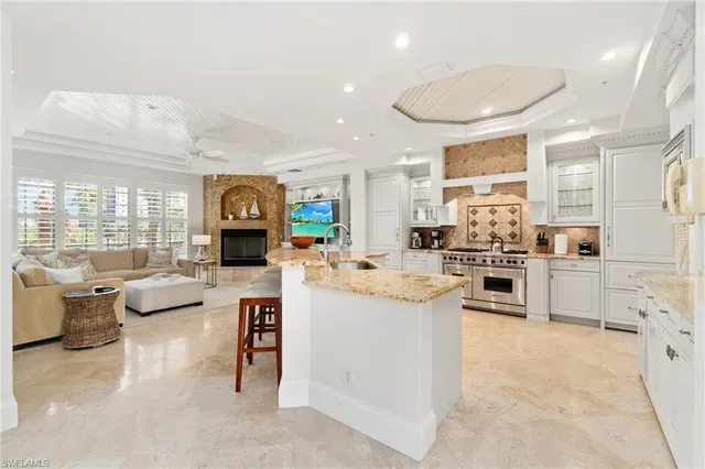a kitchen with counter top space and appliances