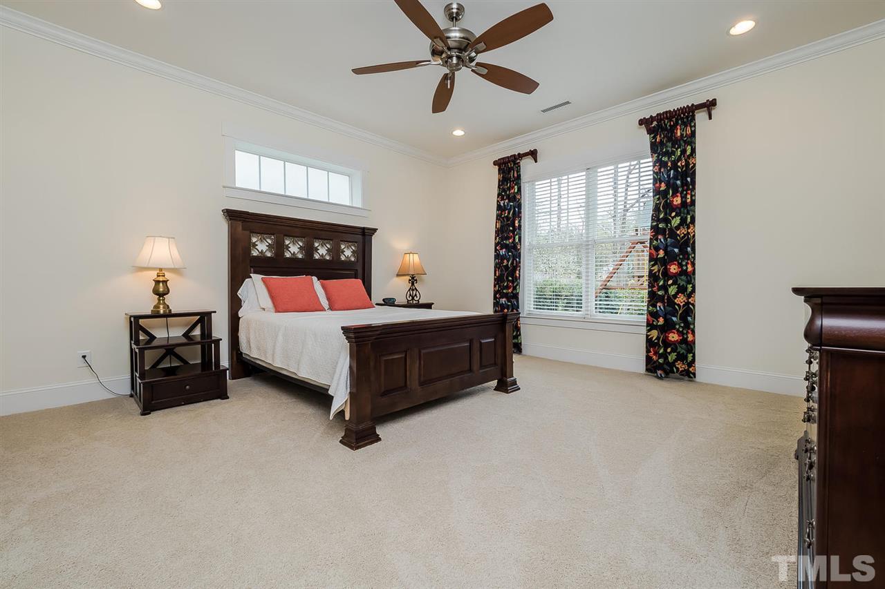 1101 Shelley Road Raleigh, NC 27609 - Photo 16 of 25 a bedroom with bed and a window