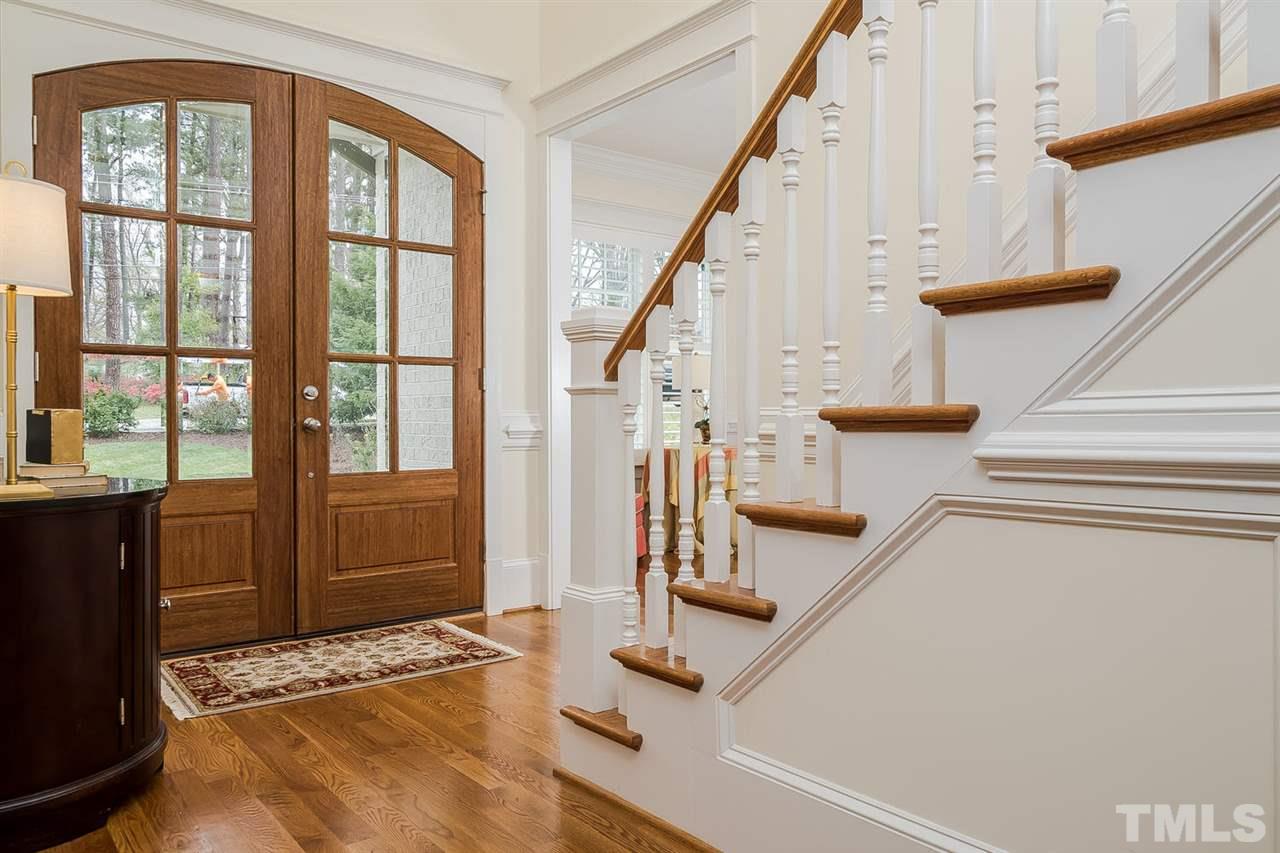 1101 Shelley Road Raleigh, NC 27609 - Photo 3 of 25 a view of staircase with white walls and windows