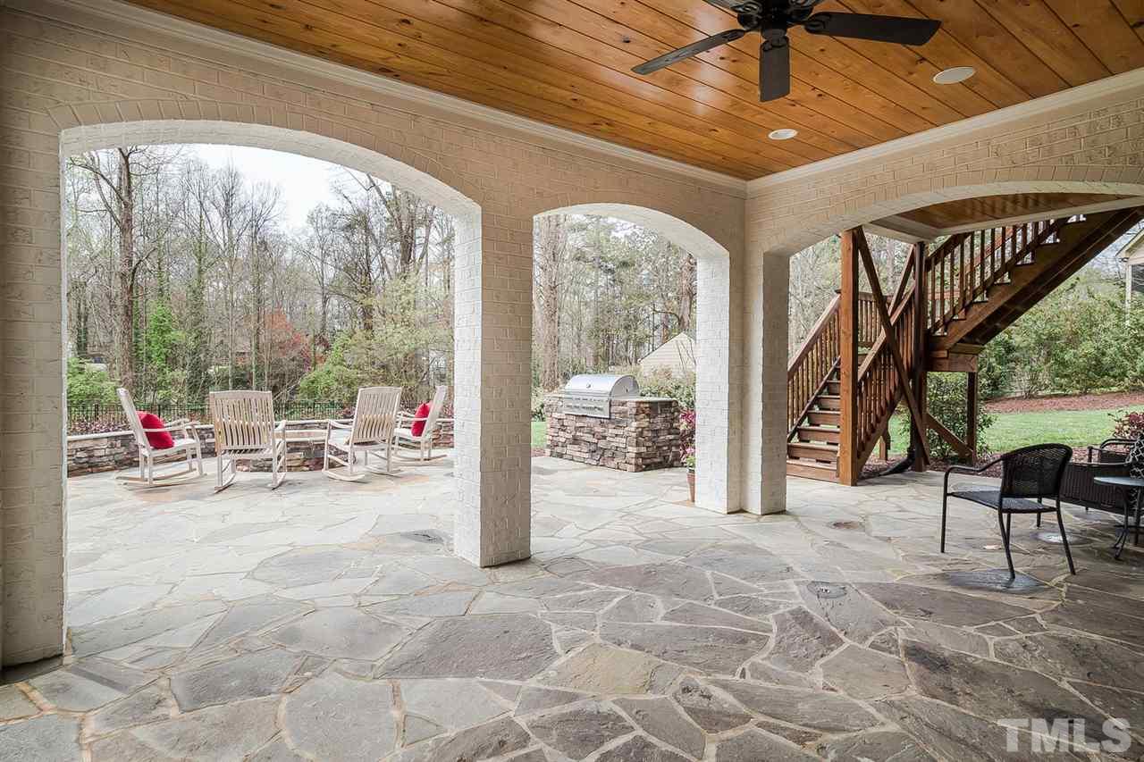 1101 Shelley Road Raleigh, NC 27609 - Photo 22 of 25 a view of a livingroom with couch and dining area