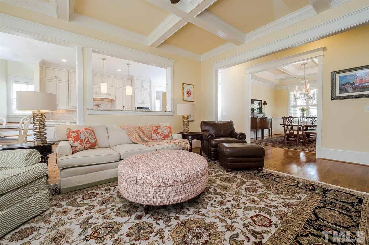 1101 Shelley Road Raleigh, NC 27609 - Photo 7 of 25 a living room with furniture and a wooden floor