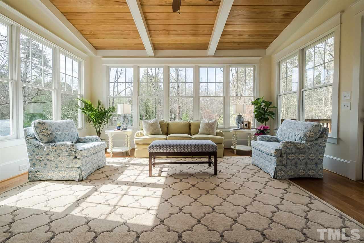 1101 Shelley Road Raleigh, NC 27609 - Photo 8 of 25 a living room with furniture and a large window