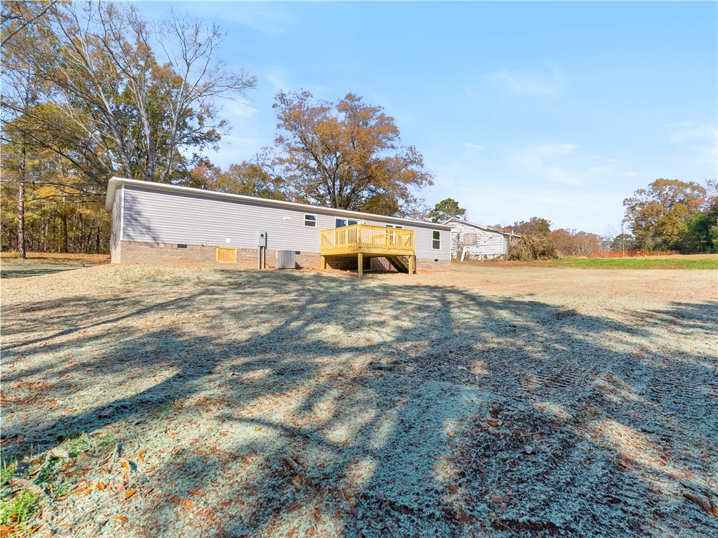 401 Mormon Church Road Seneca, SC 29678 - Photo 39 of 43 This spacious backyard with a deck offers ample outdoor living space.