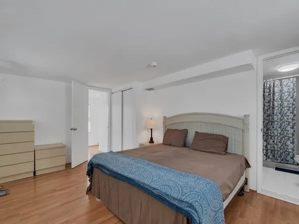 a bathroom with a sink and shower curtain