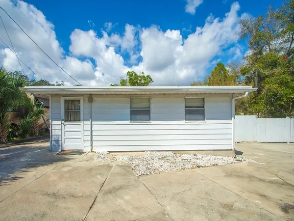 a view of a backyard with green space