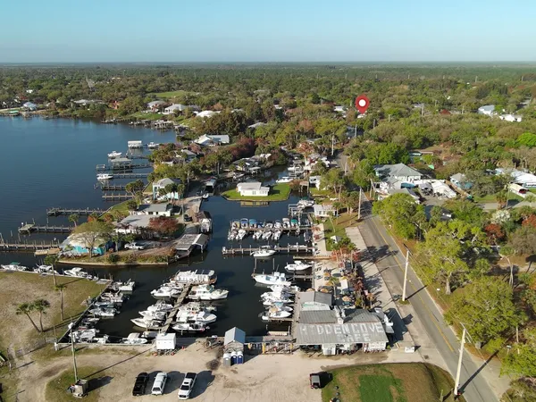 a view of a swimming pool with outdoor seating