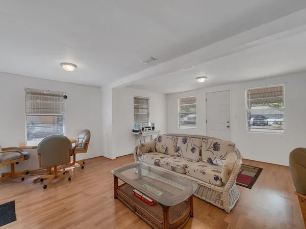 a kitchen with a sink stove and refrigerator