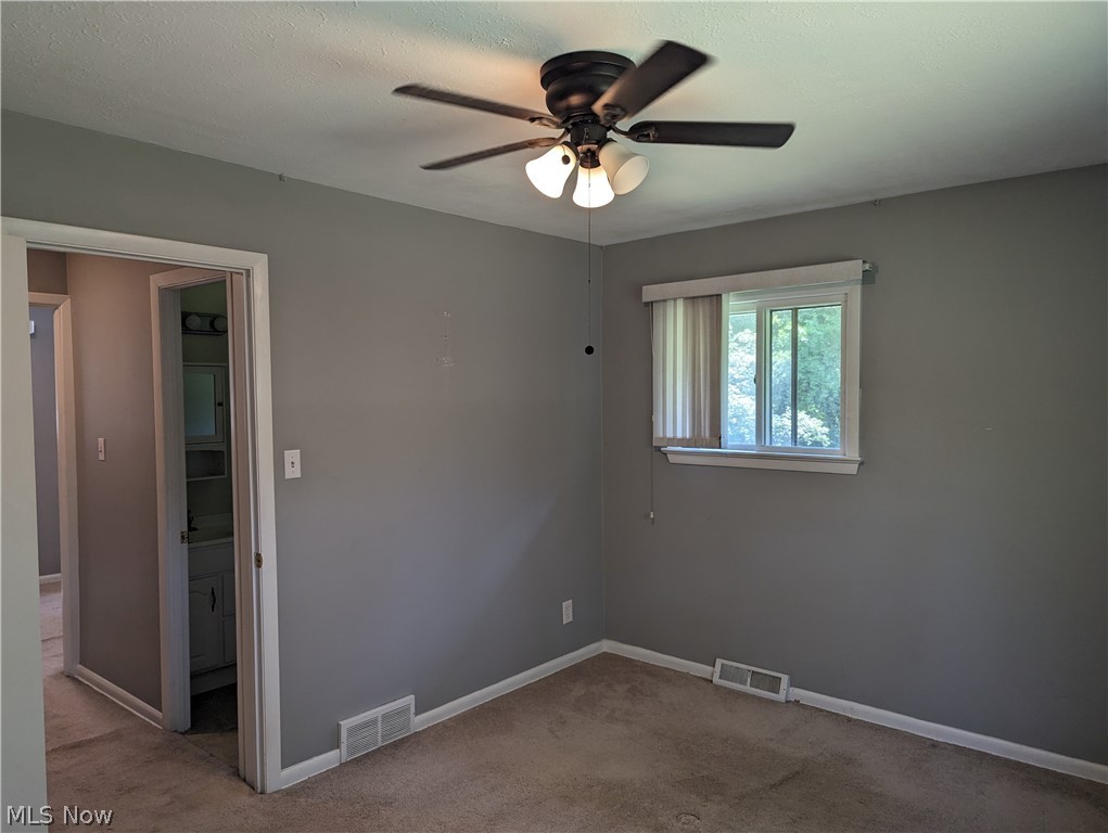 8127 Cedar Road Chesterland, OH 44026 - Photo 17 of 36 Carpet and ceiling fan