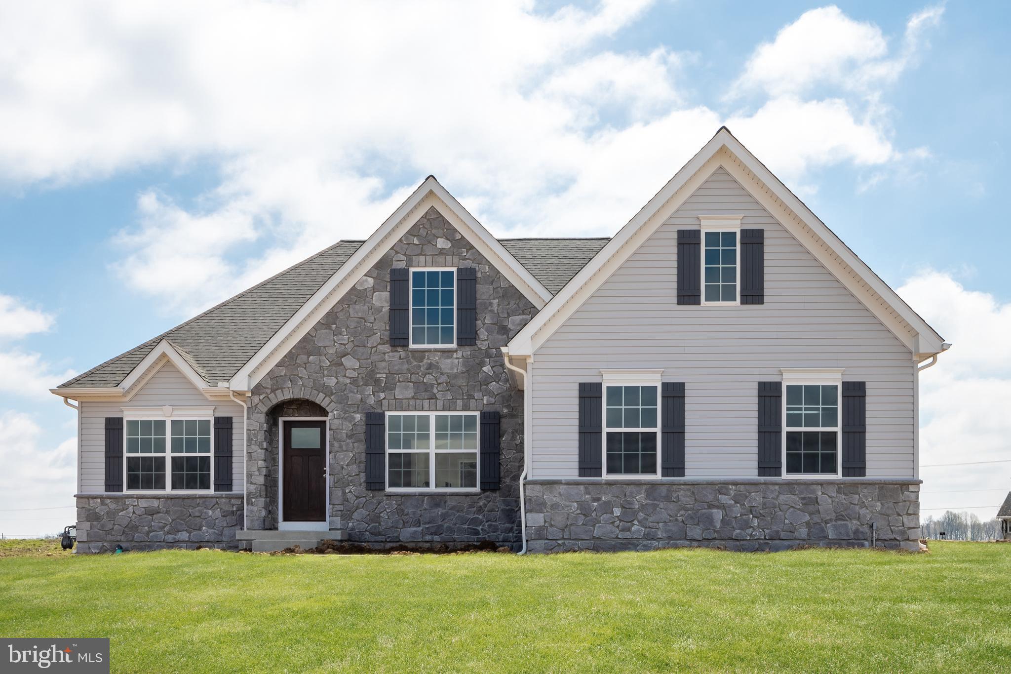 Lot#2 Jefferson Pike, Unit ARCADIA Jefferson, MD 21755 - Photo 1 of 12 a front view of brick house with a yard