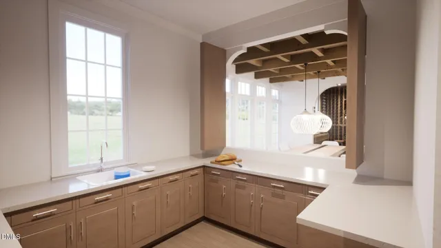 a bathroom with a granite countertop sink and a window