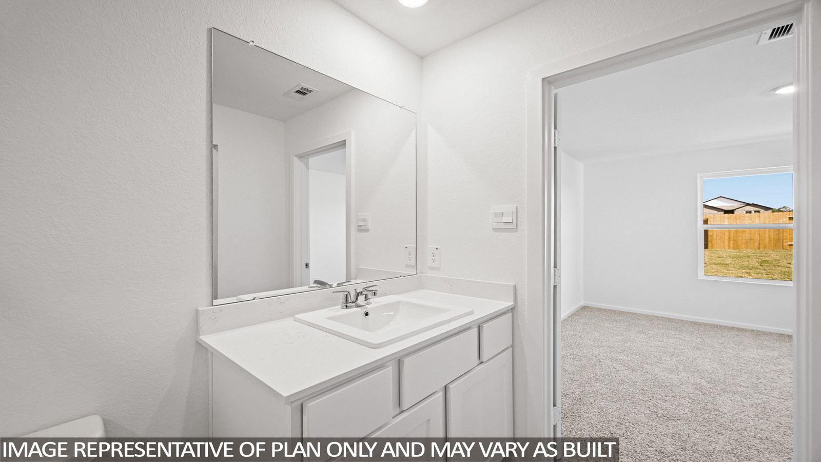 152 Baby Calf Roping Road Jarrell, TX 76537 - Photo 14 of 23 White vanity with an integrated sink and chrome faucet, set against a full-width mirror