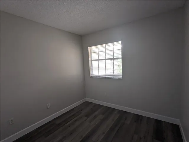 a view of a lake with a yard