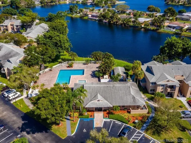 an aerial view of residential house with outdoor space