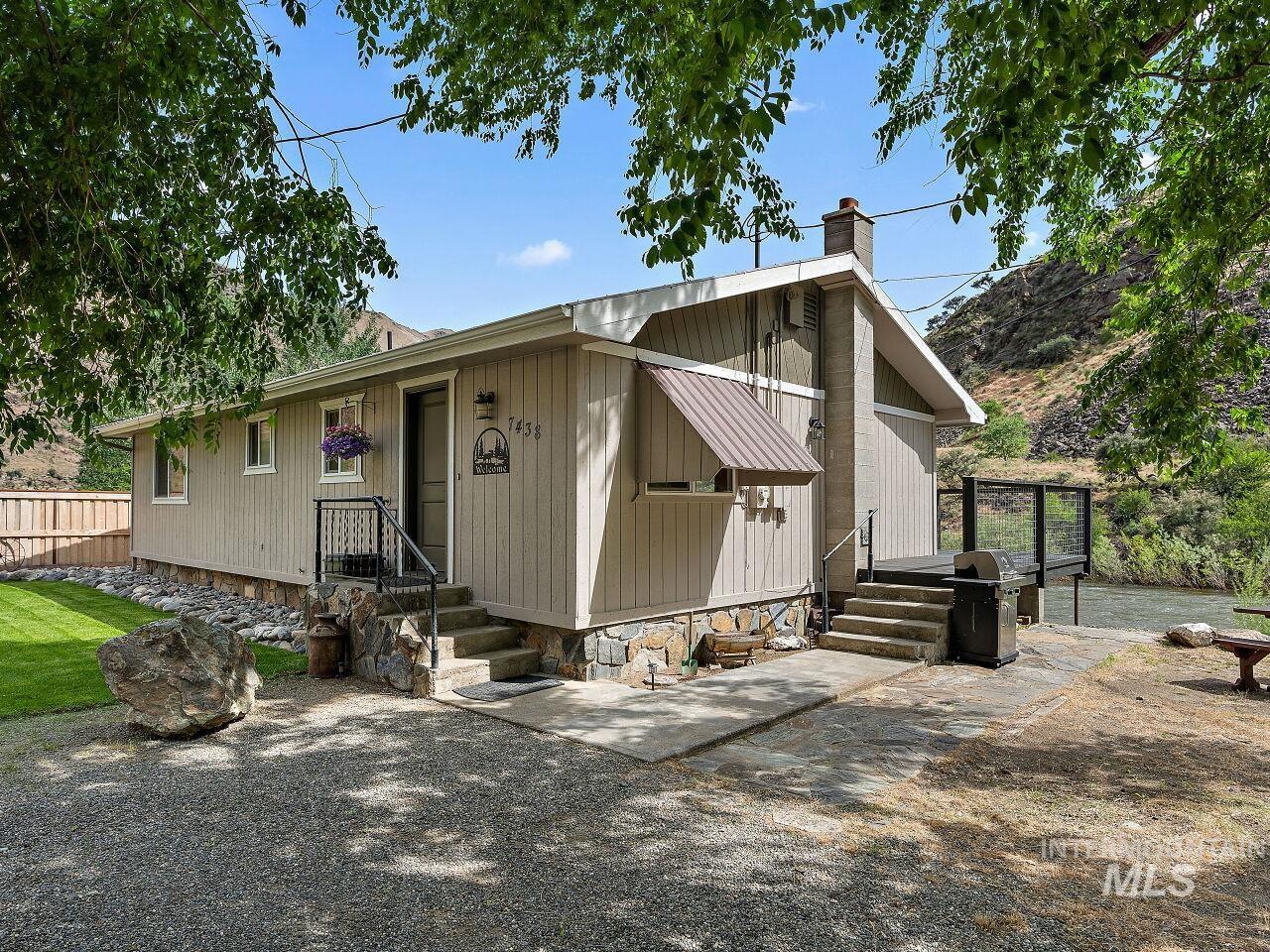 7438 Highway 95 Riggins, ID 83549 - Photo 13 of 36 View of front of house featuring a chimney