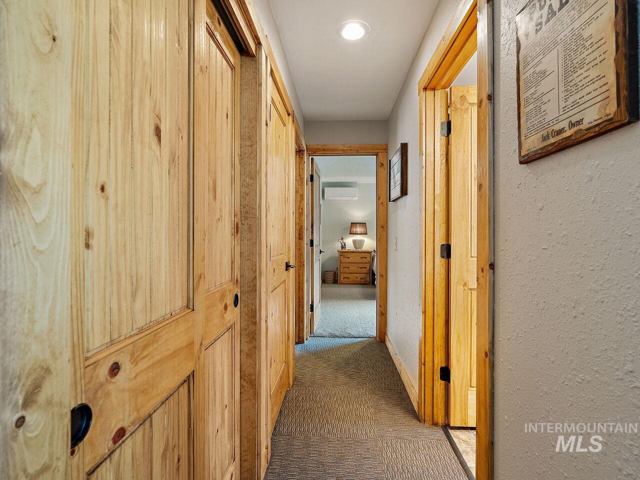 7438 Highway 95 Riggins, ID 83549 - Photo 30 of 36 Corridor featuring carpet flooring, recessed lighting, and a wall mounted mini split