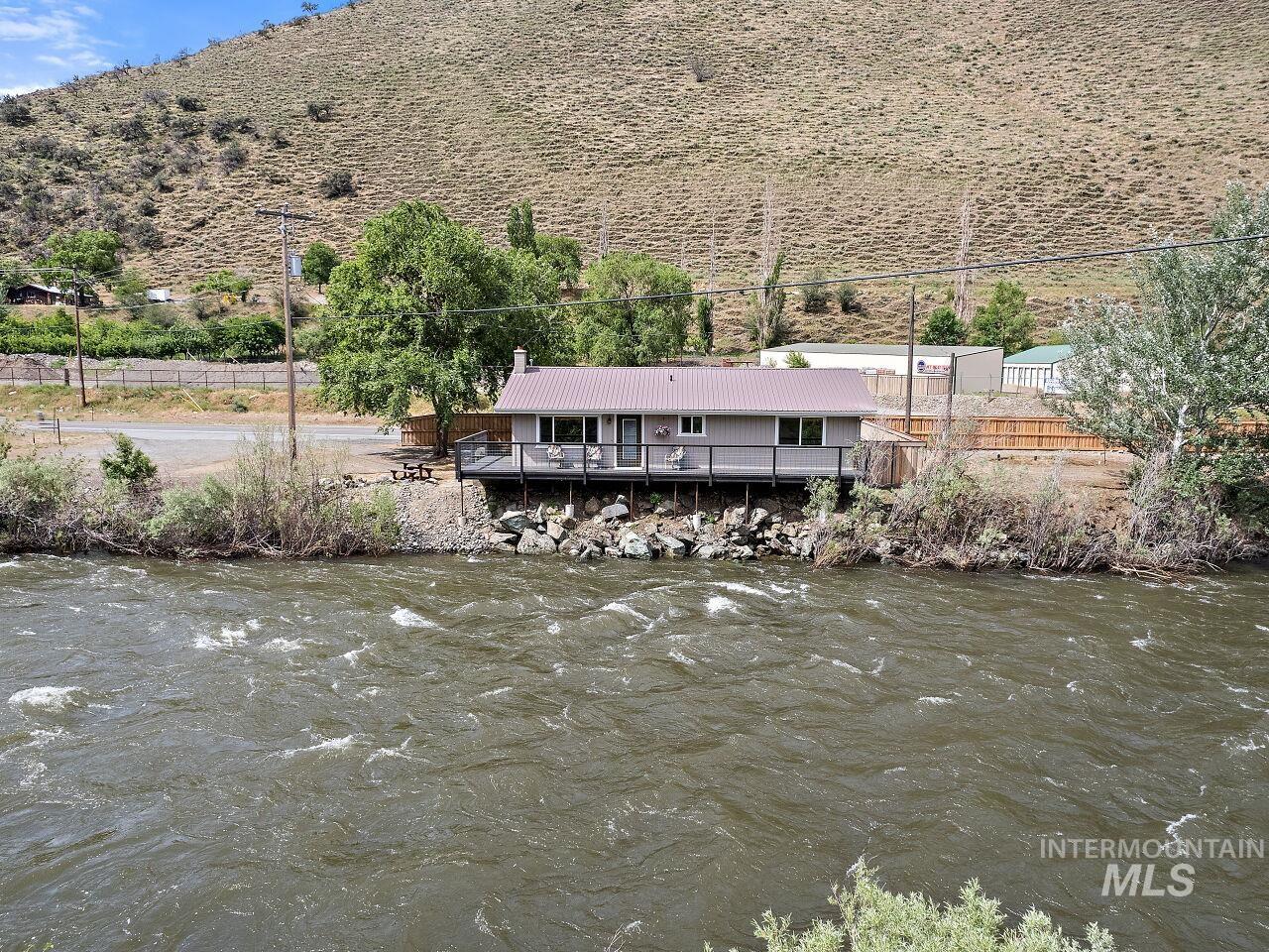 7438 Highway 95 Riggins, ID 83549 - Photo 4 of 36 Dock area with a water and mountain view