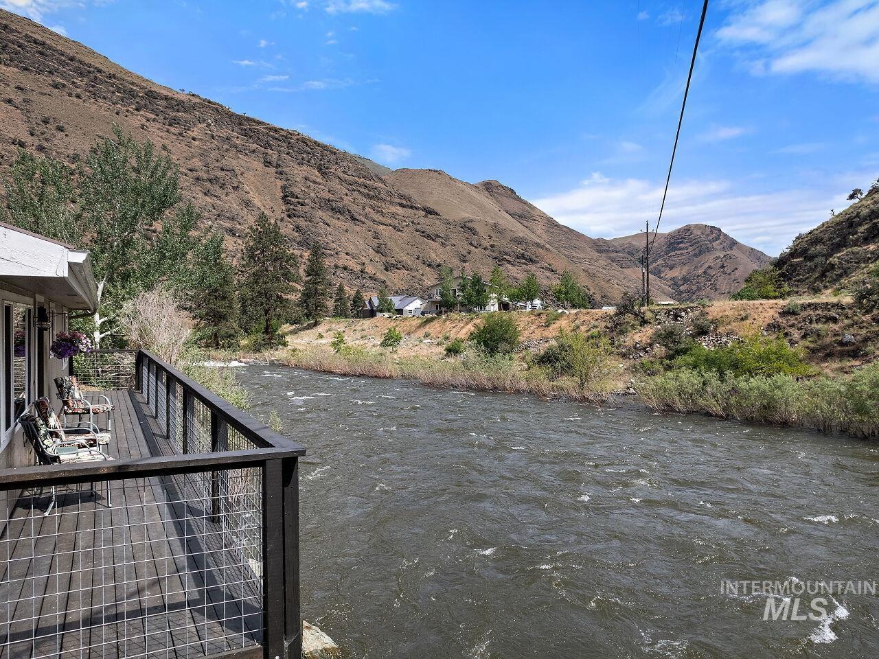 7438 Highway 95 Riggins, ID 83549 - Photo 8 of 36 View of mountain backdrop featuring a nearby body of water