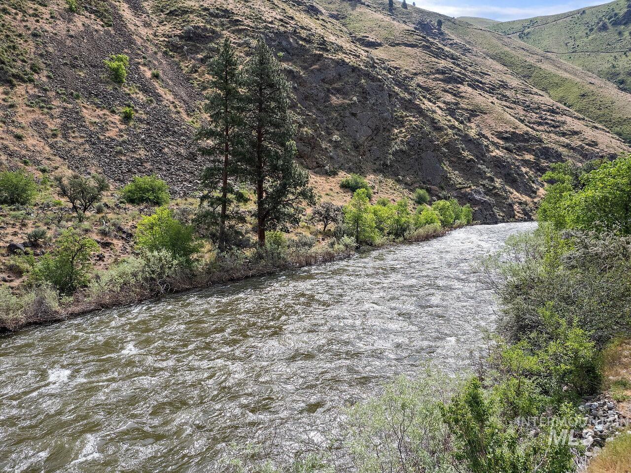 7438 Highway 95 Riggins, ID 83549 - Photo 9 of 36 View of mountain backdrop featuring a large body of water