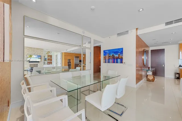 a view of a living room and dining room