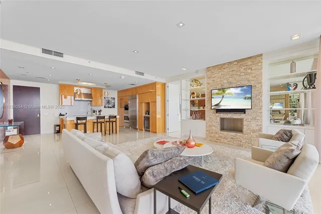 a living room with furniture and a table
