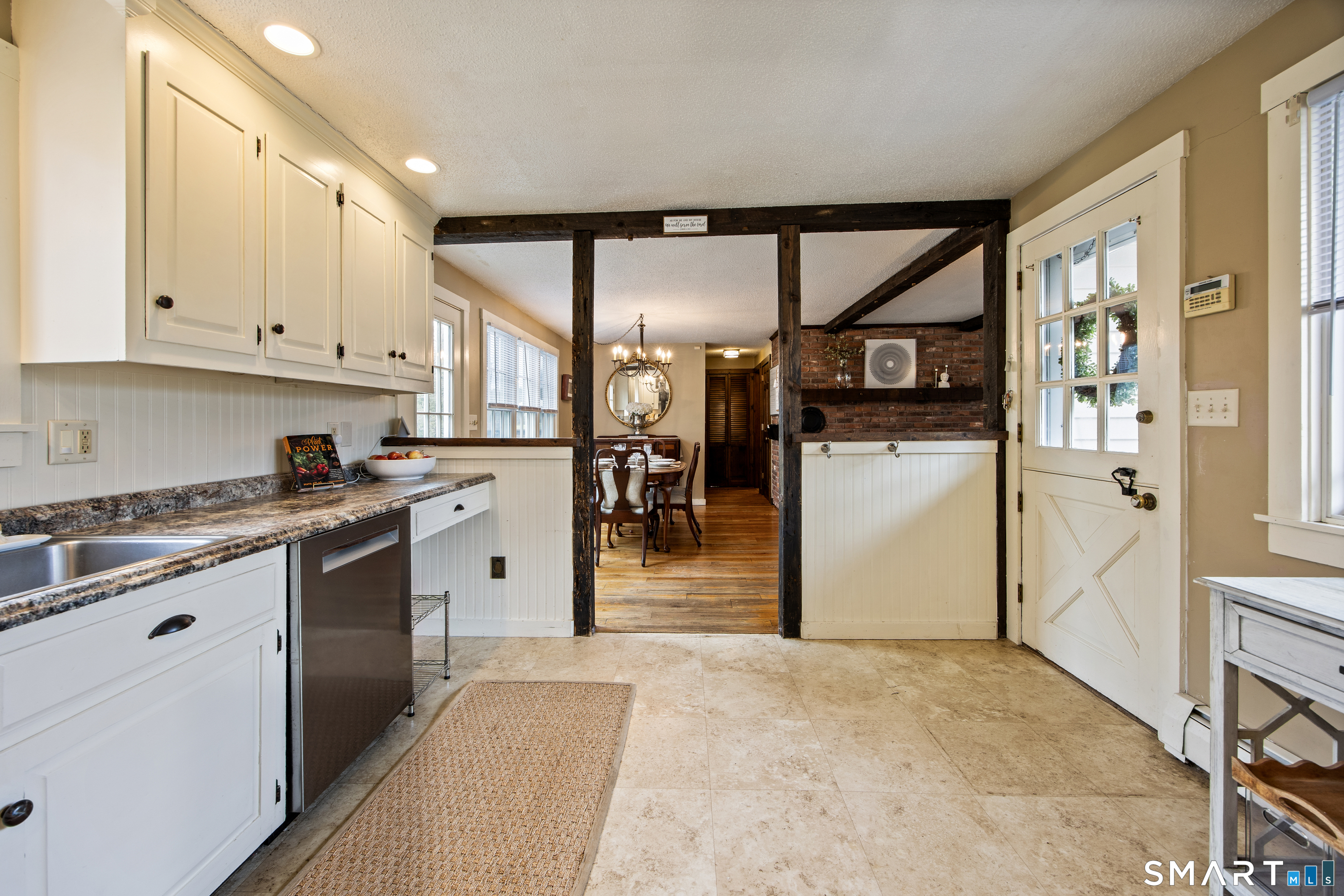 5 Livery Pool Road New Hartford, CT 06057 - Photo 12 of 40 a kitchen with a refrigerator and a sink