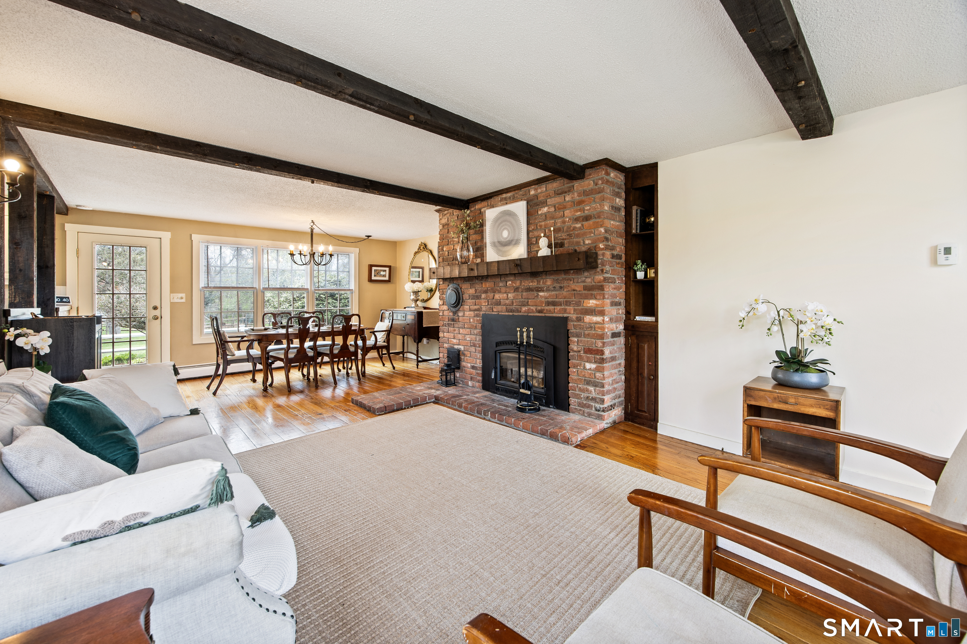 5 Livery Pool Road New Hartford, CT 06057 - Photo 15 of 40 a living room with furniture and a fireplace