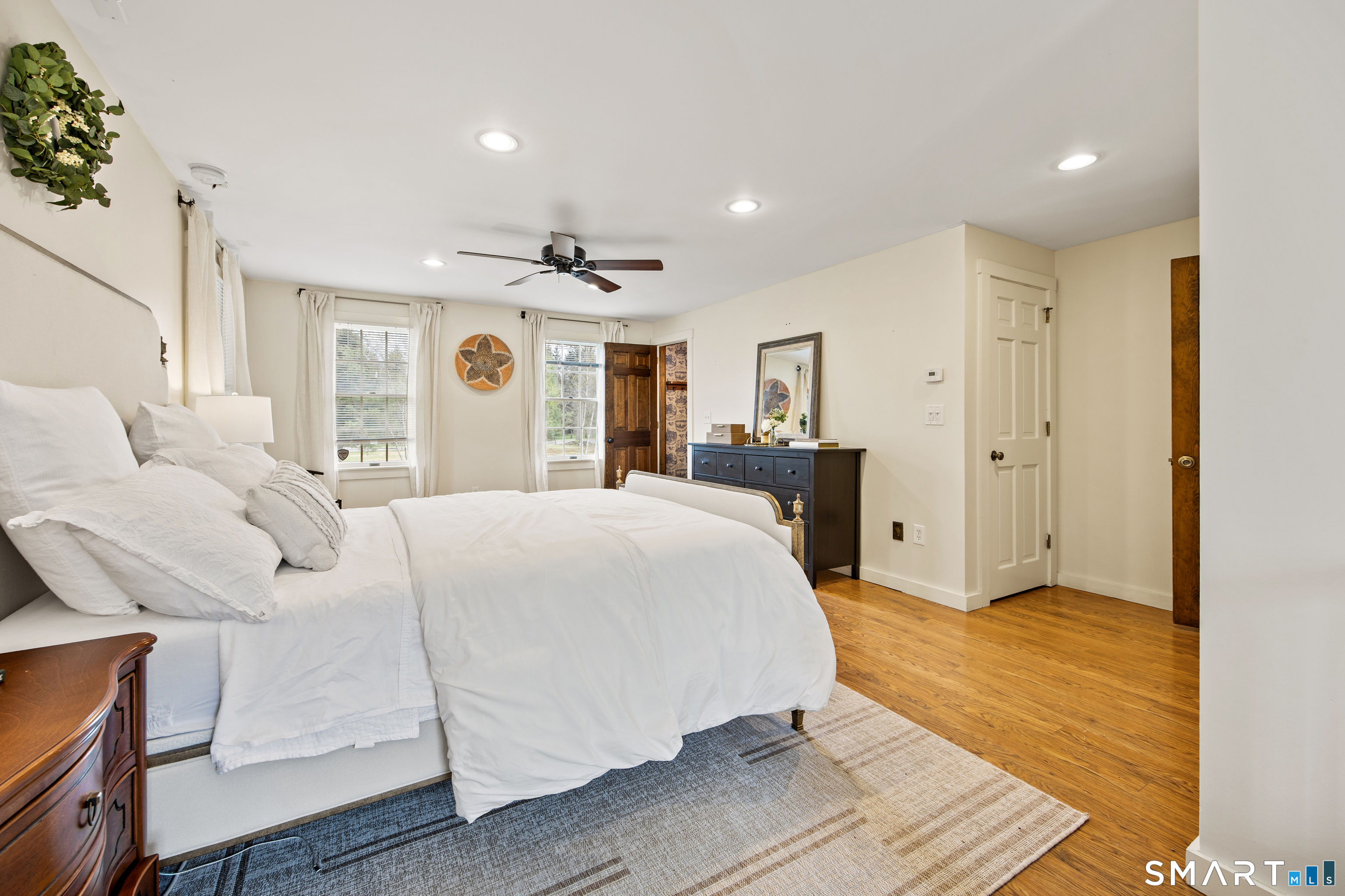 5 Livery Pool Road New Hartford, CT 06057 - Photo 22 of 40 a large white bed in a white room
