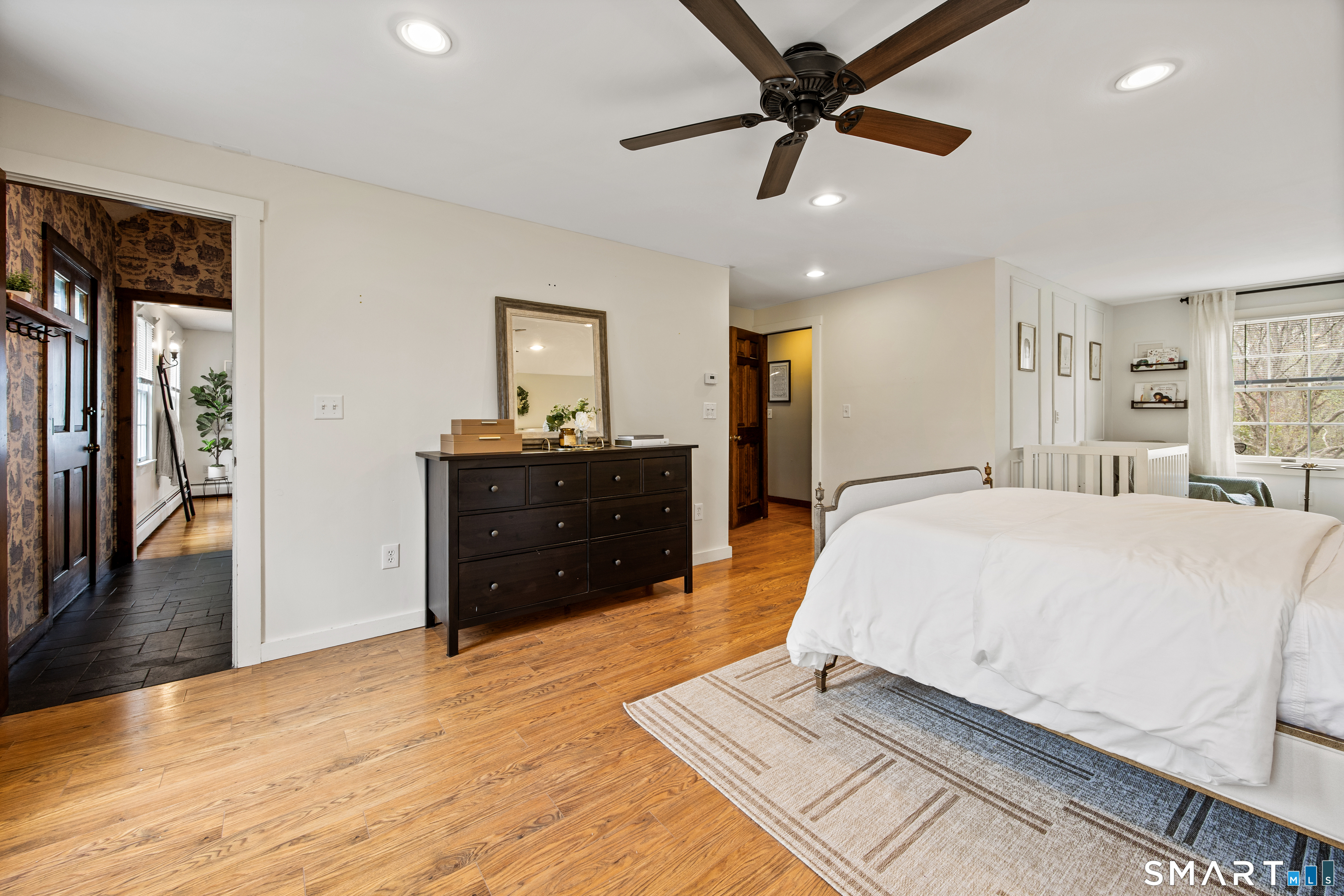 5 Livery Pool Road New Hartford, CT 06057 - Photo 24 of 40 a bed room with a bed and a ceiling fan