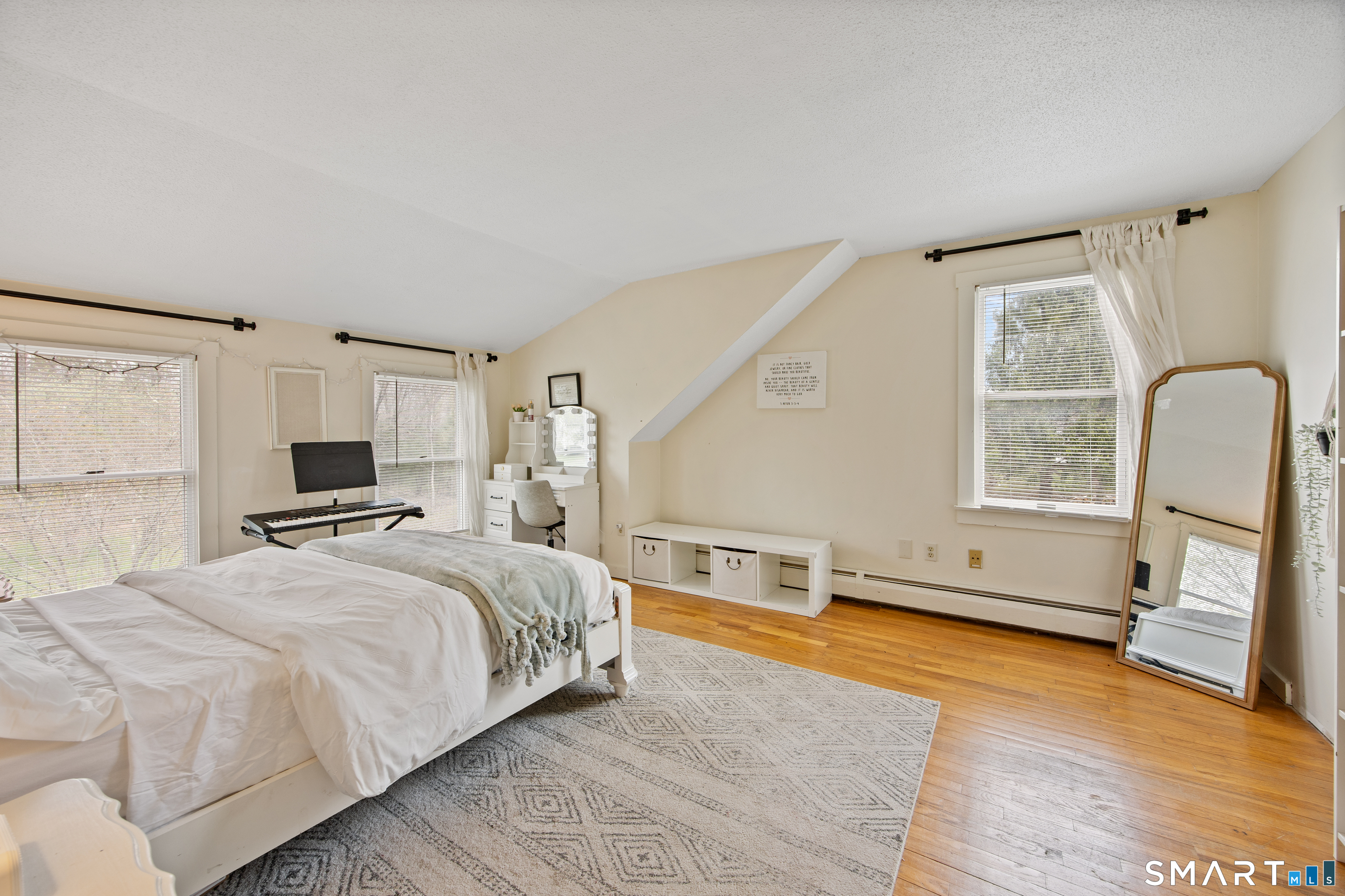 5 Livery Pool Road New Hartford, CT 06057 - Photo 25 of 40 a bedroom with a large bed and a window