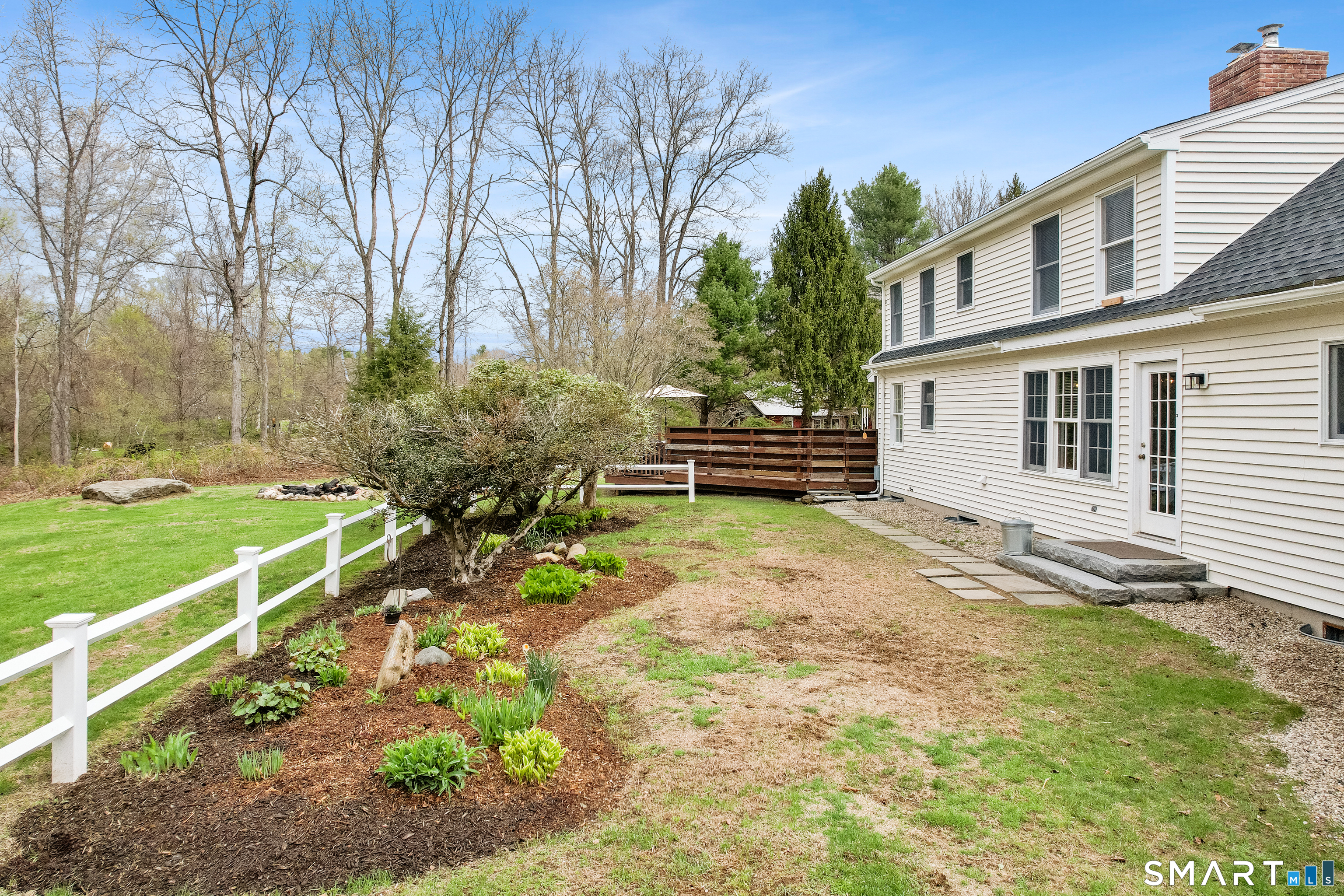 5 Livery Pool Road New Hartford, CT 06057 - Photo 37 of 40 a house with garden in front of it