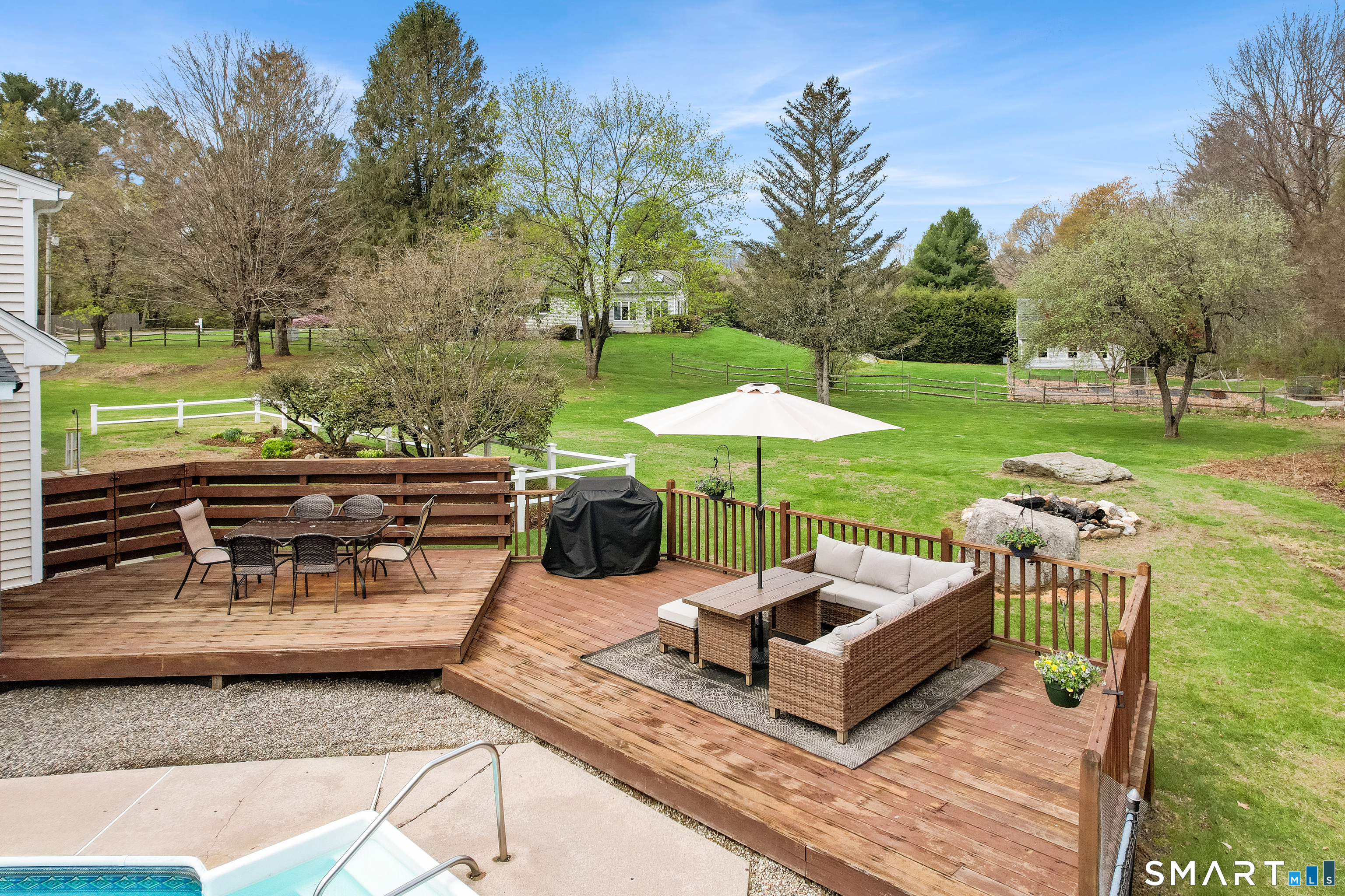 5 Livery Pool Road New Hartford, CT 06057 - Photo 38 of 40 a view of a patio with a table and chairs