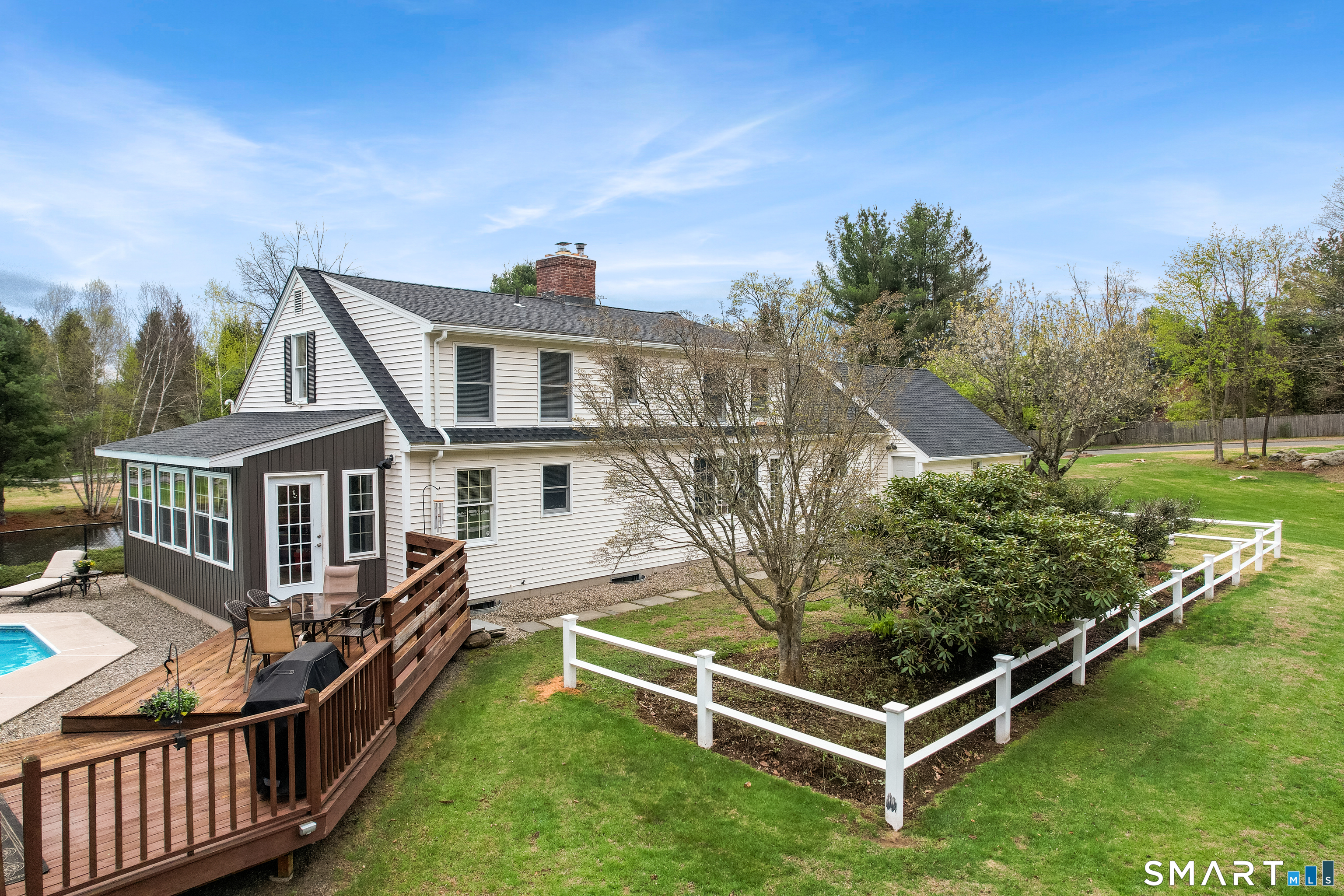 5 Livery Pool Road New Hartford, CT 06057 - Photo 40 of 40 a view of a house with wooden deck and furniture