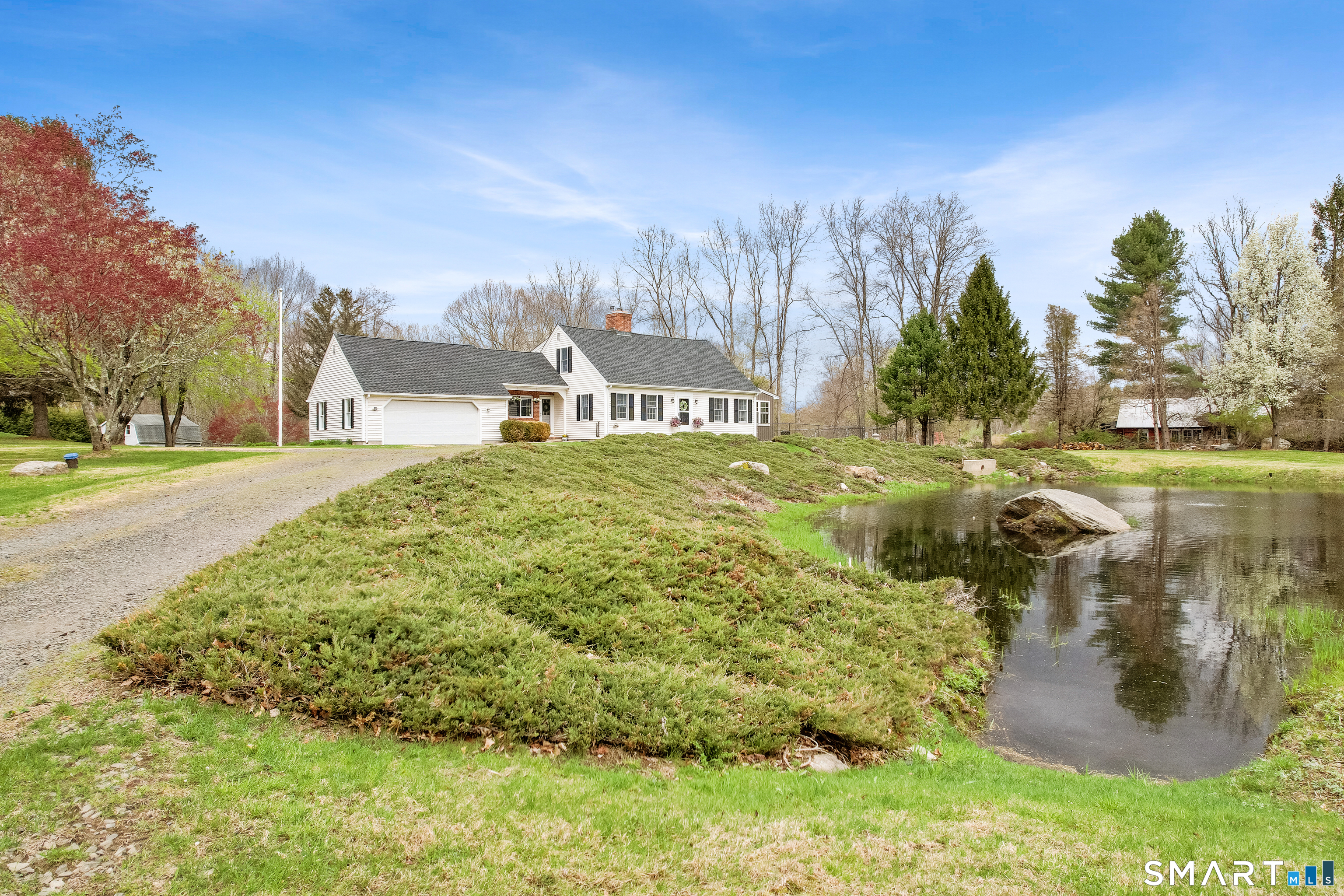5 Livery Pool Road New Hartford, CT 06057 - Photo 4 of 40 a big yard with lots of green space and plants