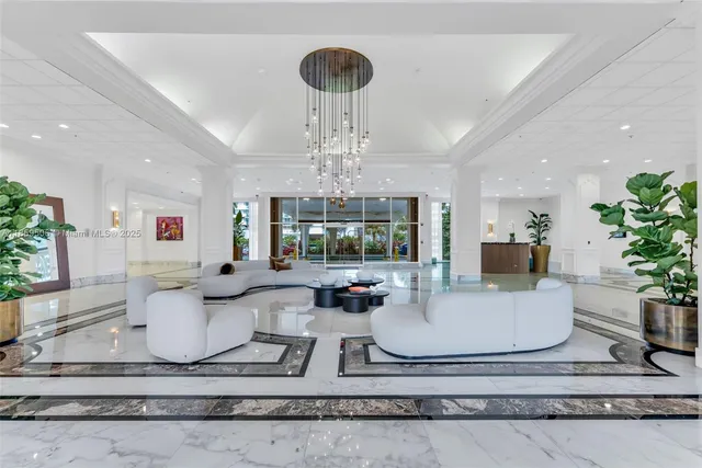 a view of a livingroom with table & chairs
